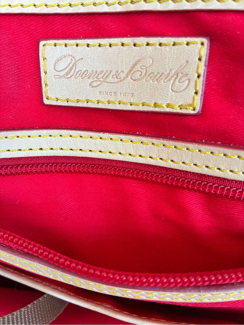 Dooney & Bourke Black Patent Leather Satchel with Tan Trim and Red-Accent Strap